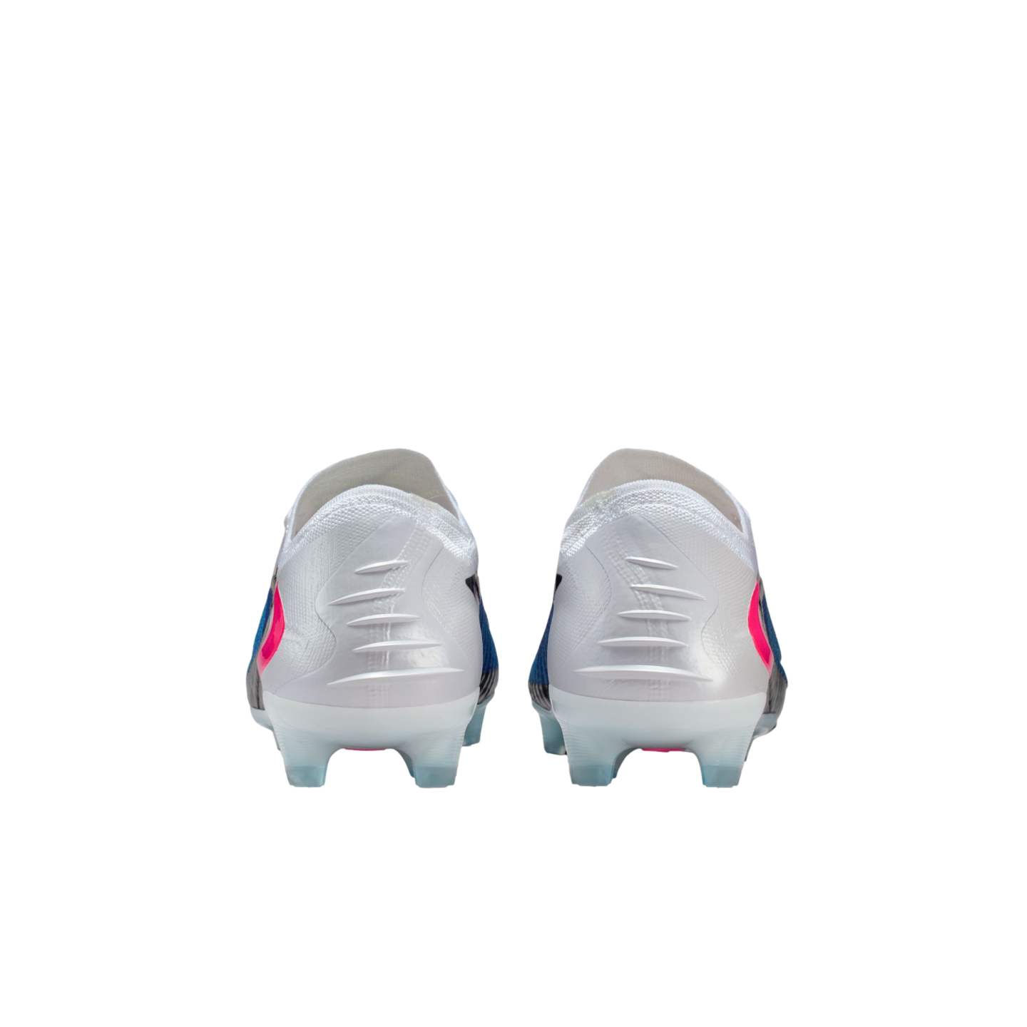 Back view of white soccer cleats with pink and blue accents on a black background.