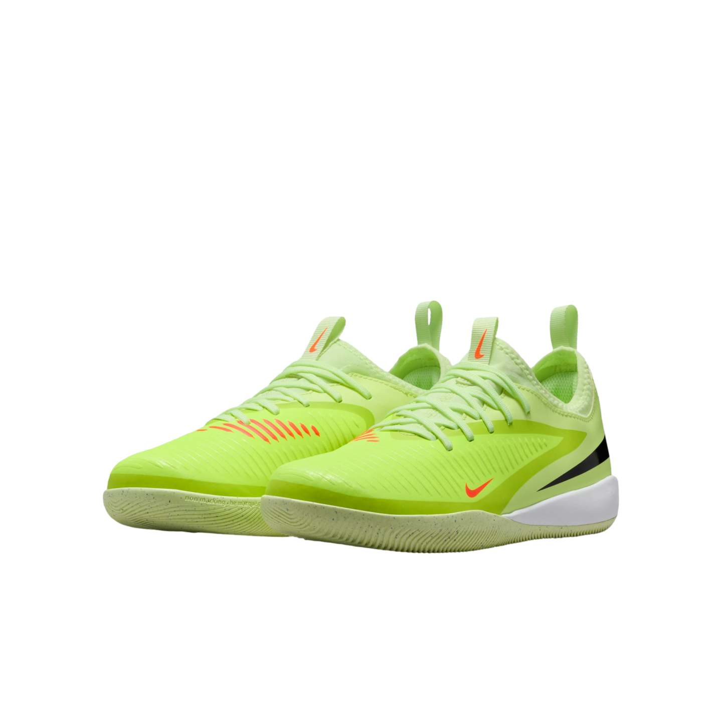 Neon lime green Nike tennis shoes with orange and black accents on a solid black background.