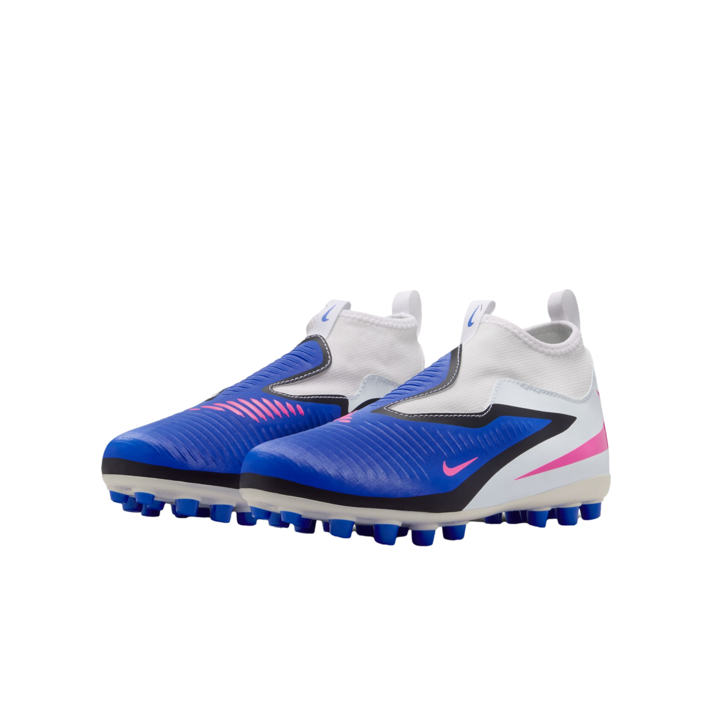A pair of blue, white, and pink Nike children's laceless soccer cleats shown from a side angle against a black background.
