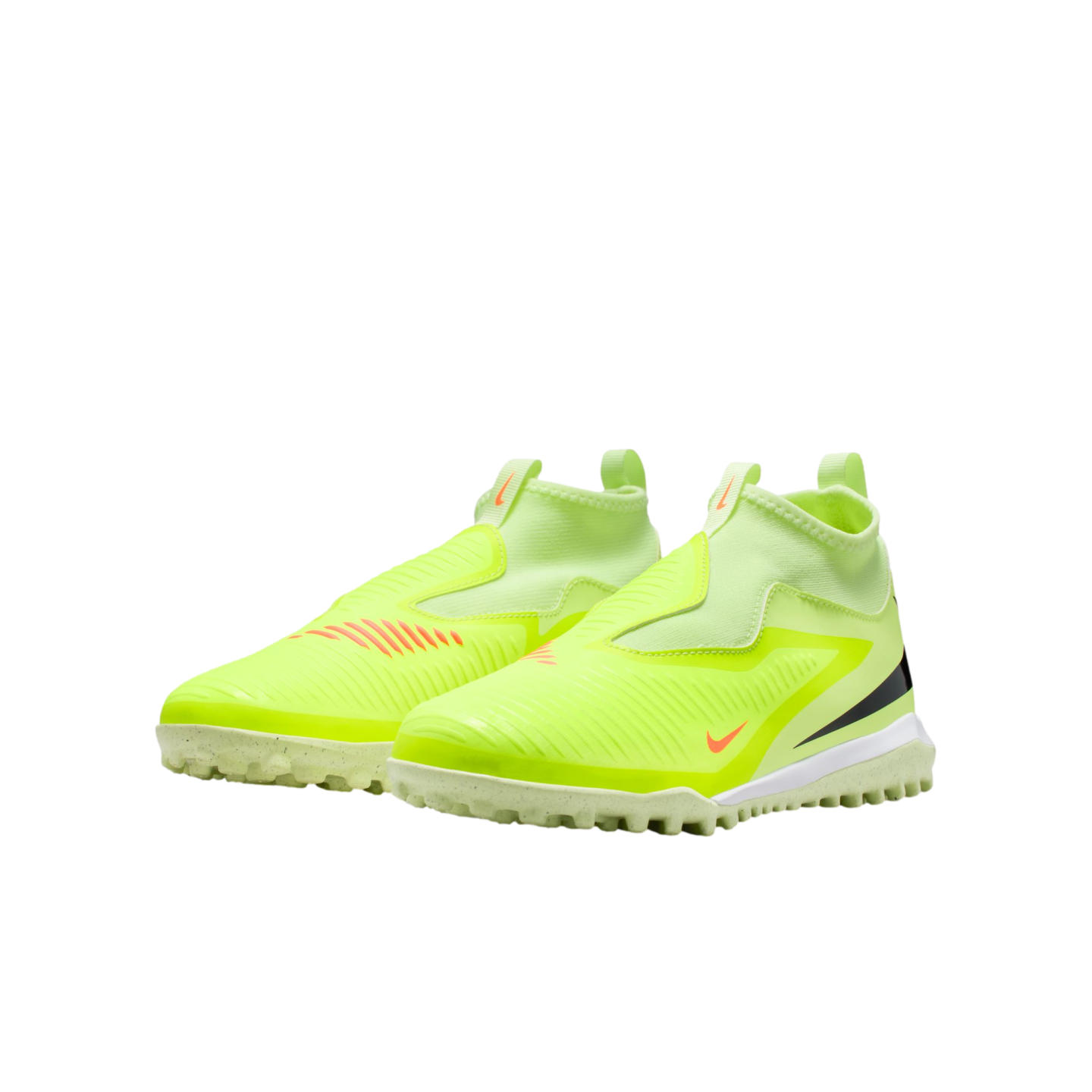 A pair of neon yellow, laceless Nike soccer turf shoes with orange and black swoosh accents on a solid black background.
