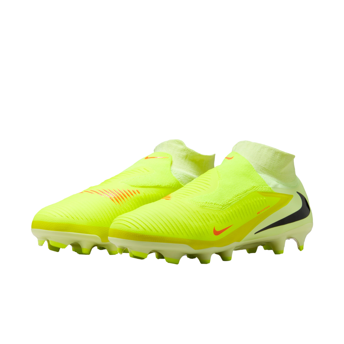 A pair of neon yellow laceless Nike soccer cleats with orange swooshes against a black background.