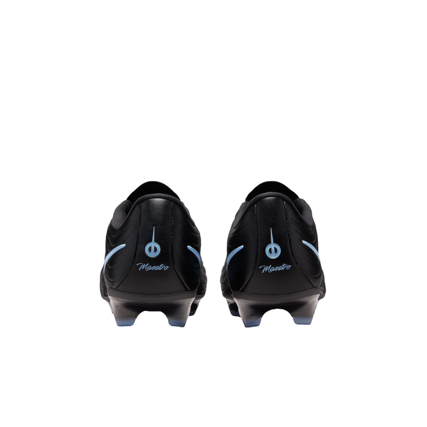 Rear view of two black soccer cleats with light blue "Maestro" script and circular logos on the heels, set against a solid black background.