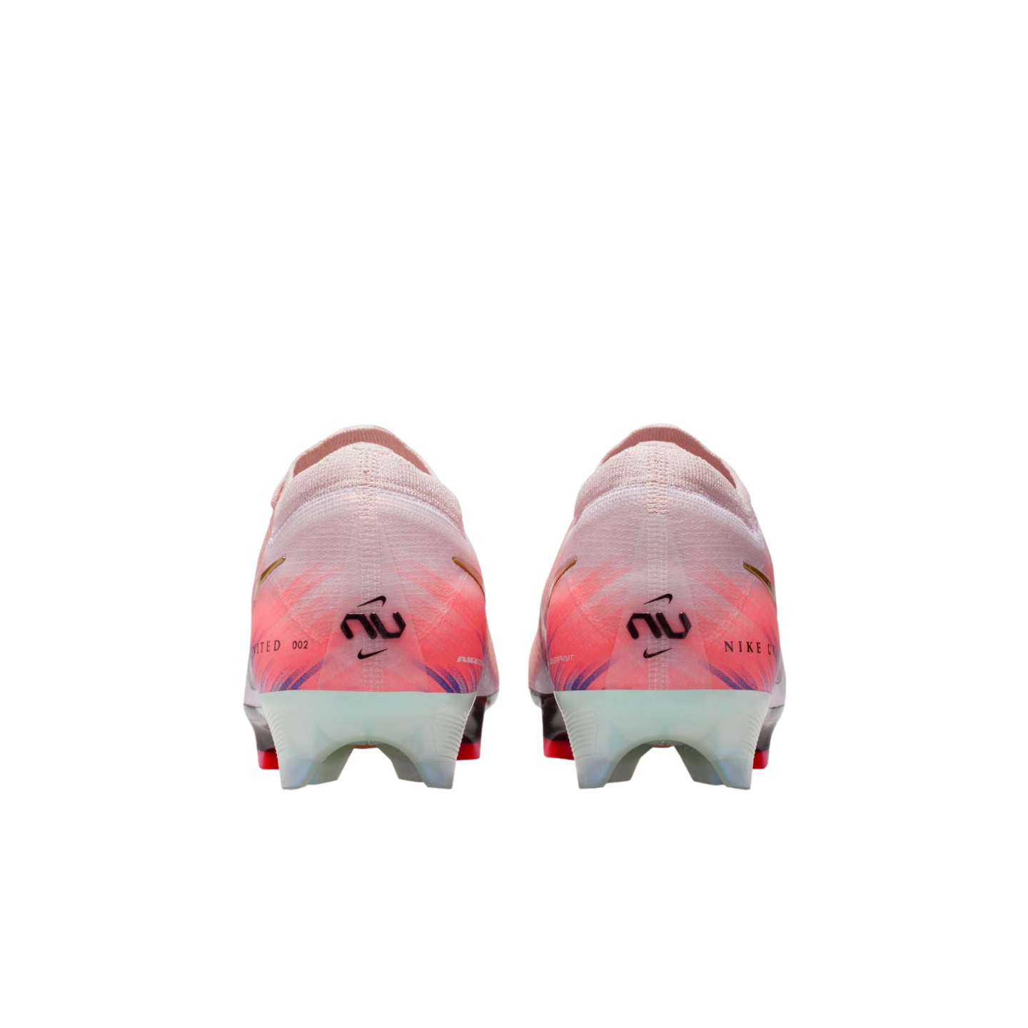 Rear view of a pair of light pink Nike soccer cleats with "NU" branding on the heels and translucent studs, isolated on a black background.
