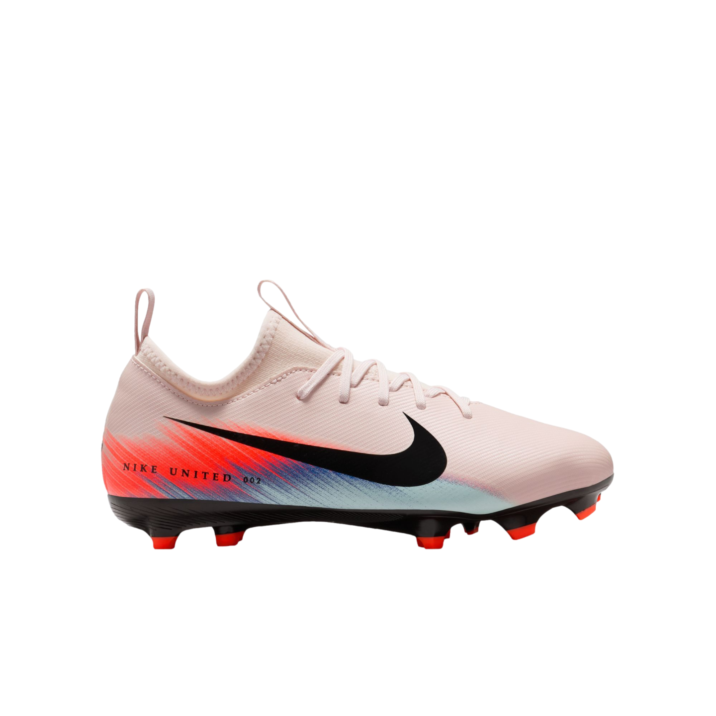 Pale pink Nike soccer cleat with a black swoosh and red/blue heel graphic, featuring red studs on a black sole, shown in profile on a black background.