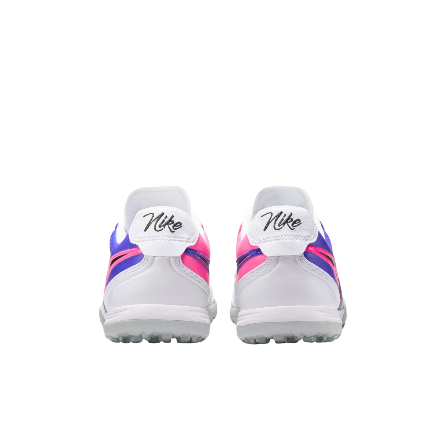 Rear view of two white Nike athletic shoes with vibrant pink and purple accents and a script logo on the heel tabs, isolated on a black background.