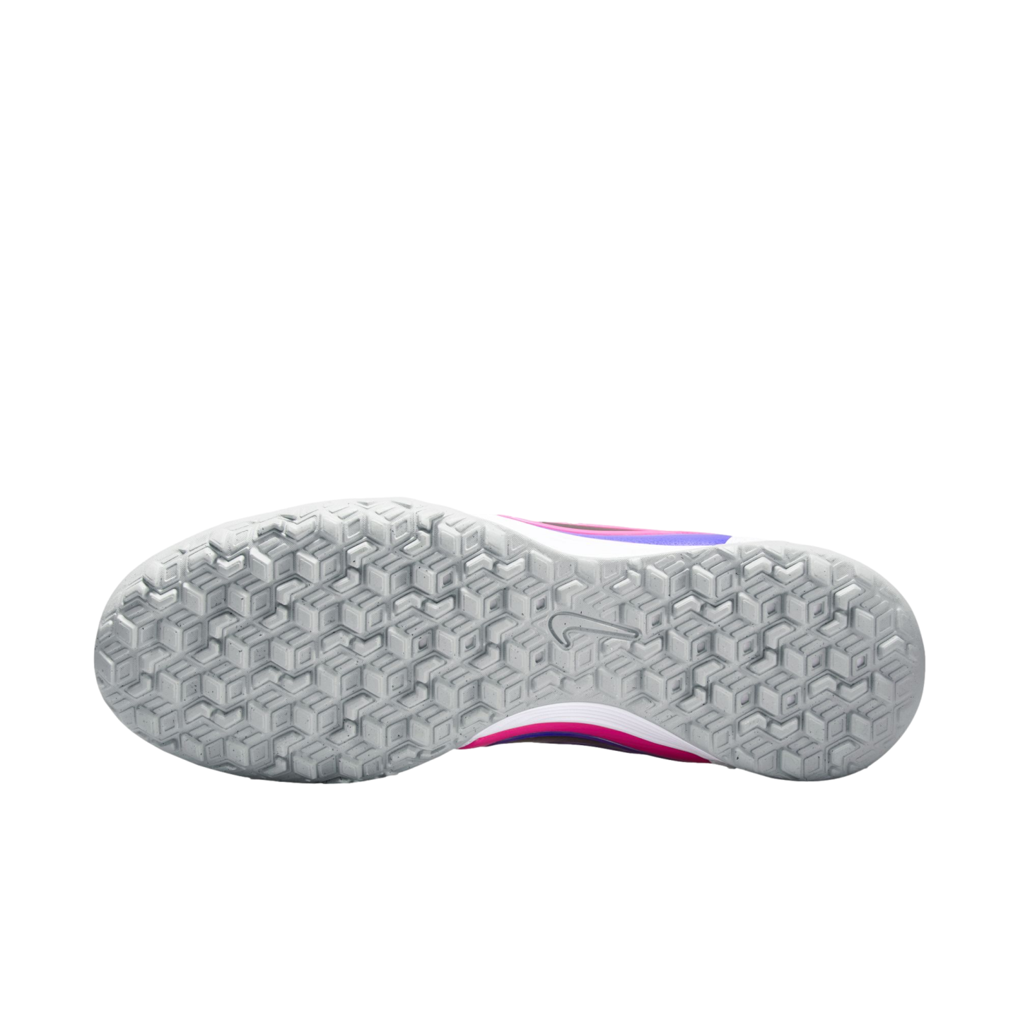 Bottom view of a Nike turf shoe with a textured grey outsole and small studs. Pink and purple accents are visible on the sides against a solid black background.