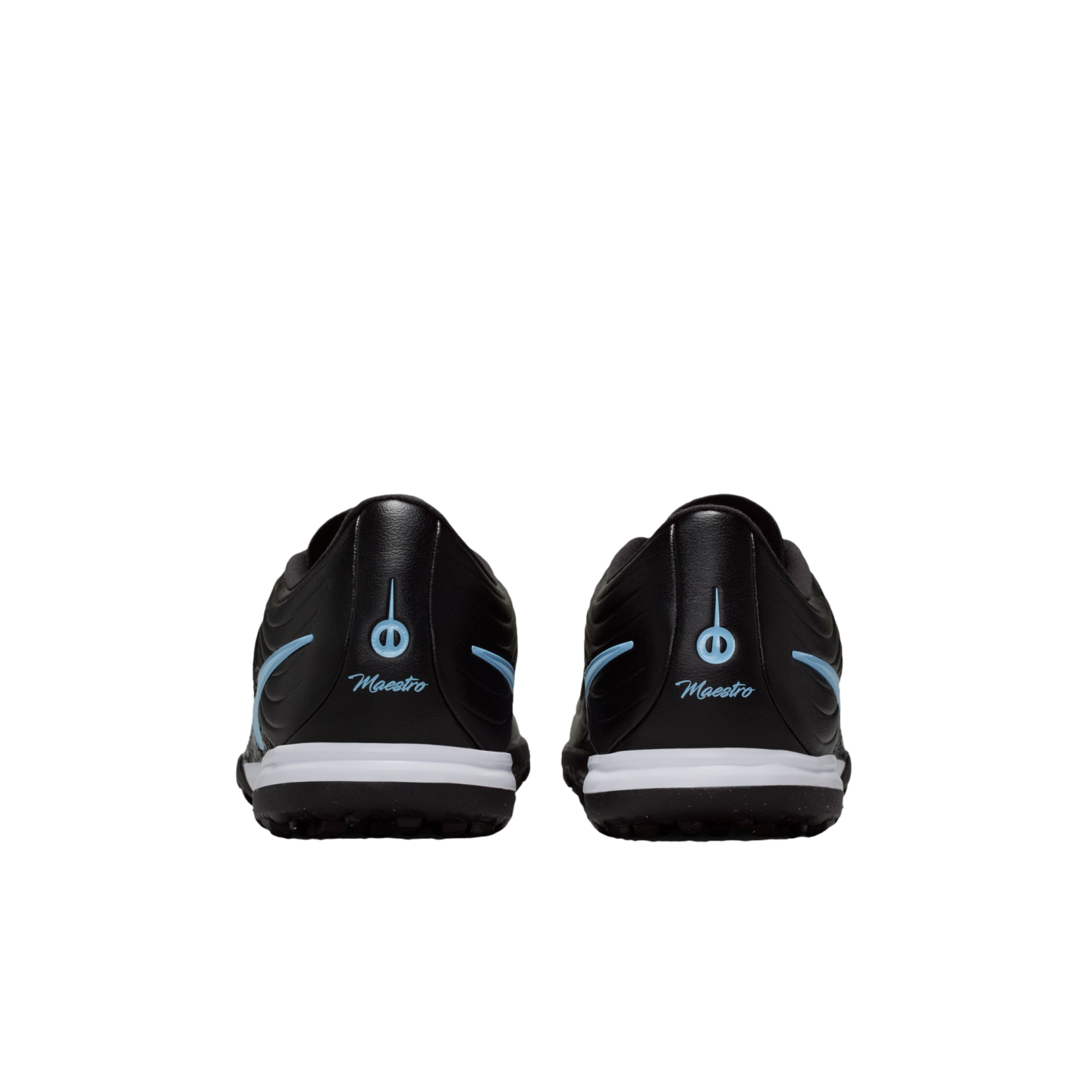 Rear view of two black soccer shoes with light blue "Maestro" script and logos on the heels, featuring white midsoles against a black background.