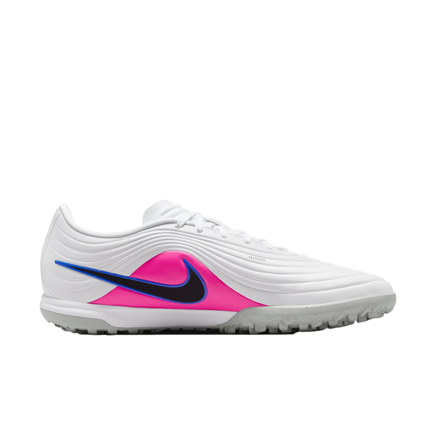White Nike turf soccer shoe with a pink side panel and black swoosh outlined in blue. Light grey speckled sole.