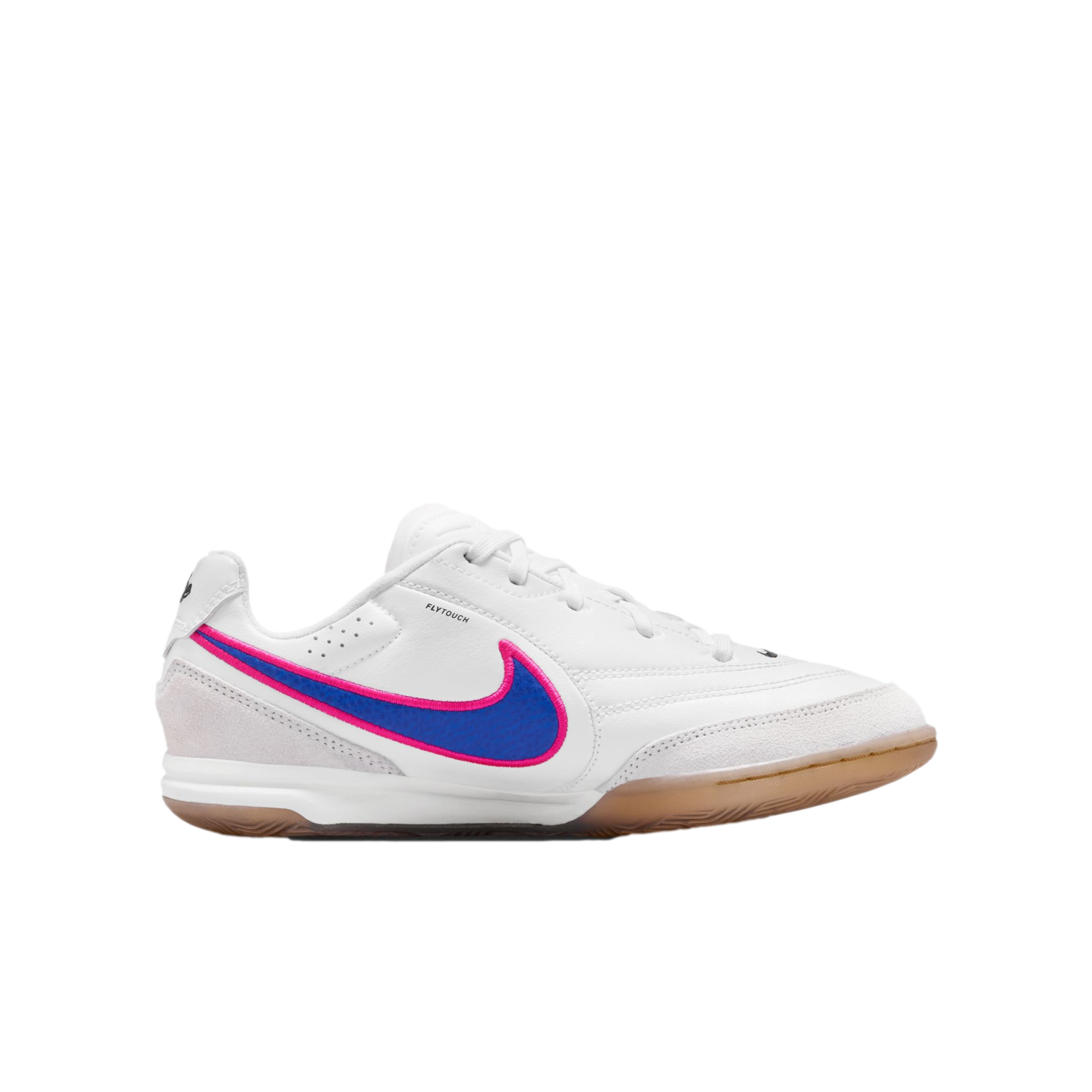 A white Nike indoor soccer shoe with a blue and pink swoosh and gum rubber outsole, shown in profile against a black background.