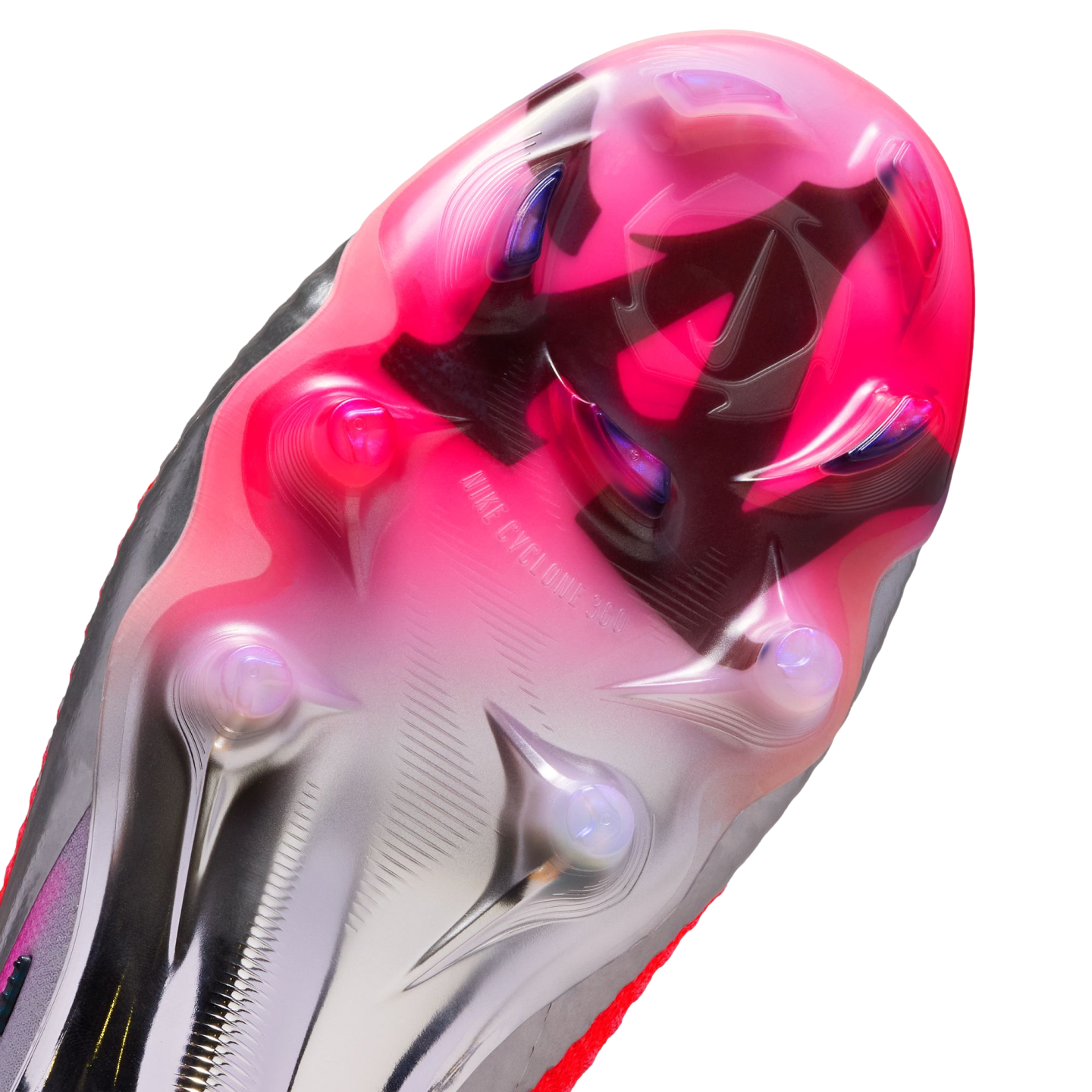 Close-up of a pink and silver Nike soccer cleat soleplate, featuring "NIKE CYCLONE 360" branding and various traction studs.