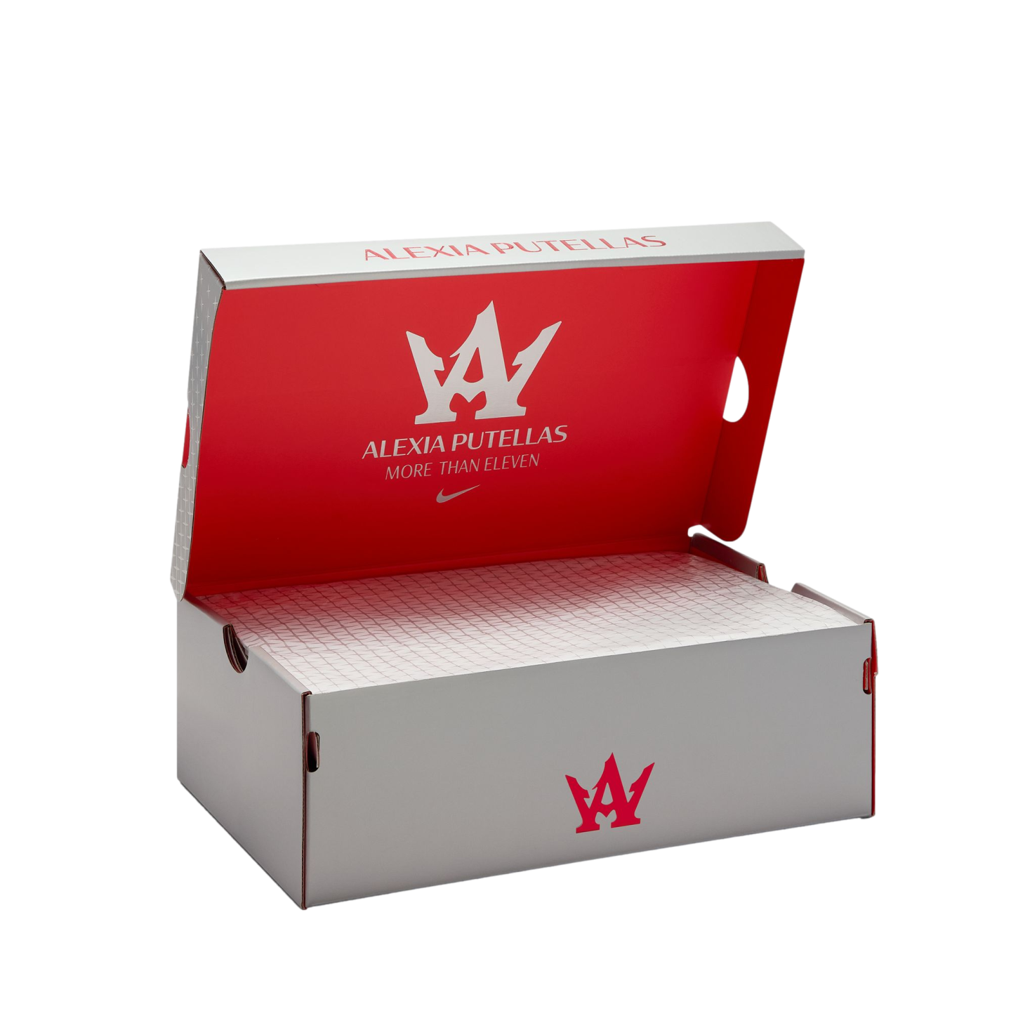 Open white and red Nike shoebox for soccer player Alexia Putellas, featuring her personal logo and slogan "More Than Eleven" inside the lid.