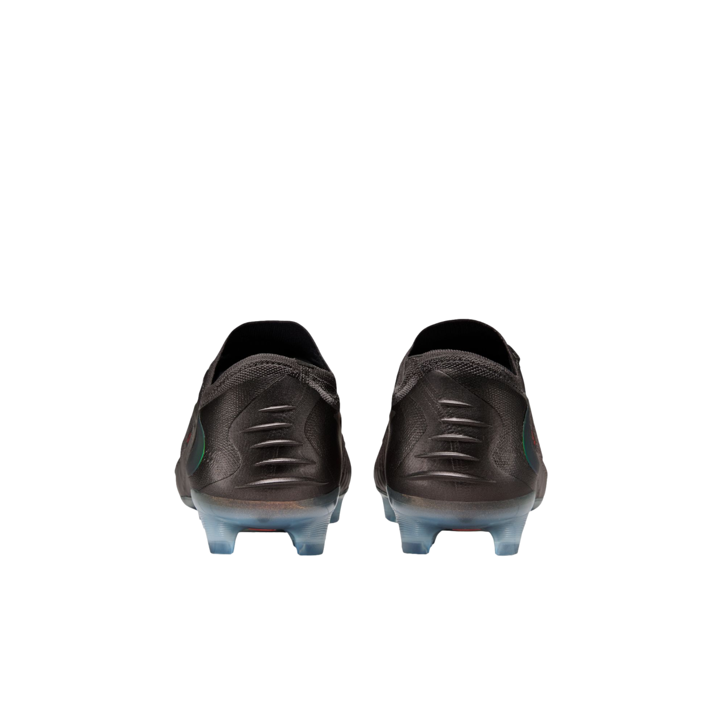 Rear view of black soccer cleats with iridescent accents and translucent blue studs, set against a solid black background.