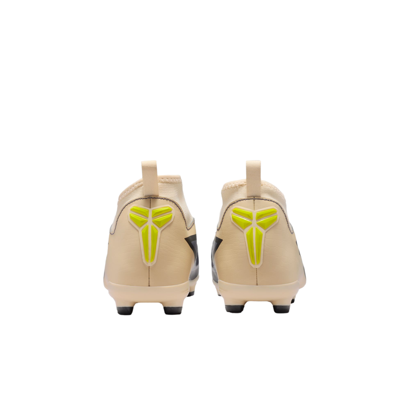 Back view of a pair of light beige soccer cleats featuring bright yellow Kobe logos on the heels, set against a black background.