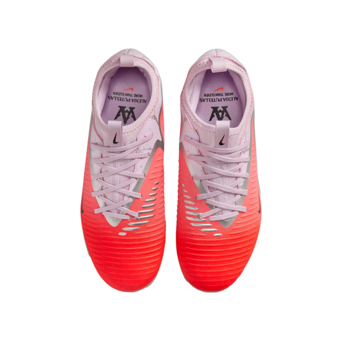 Top-down view of pink and orange Nike soccer cleats with "Alexia Putellas" branding on the insoles. The shoes feature silver accents and a gradient design.