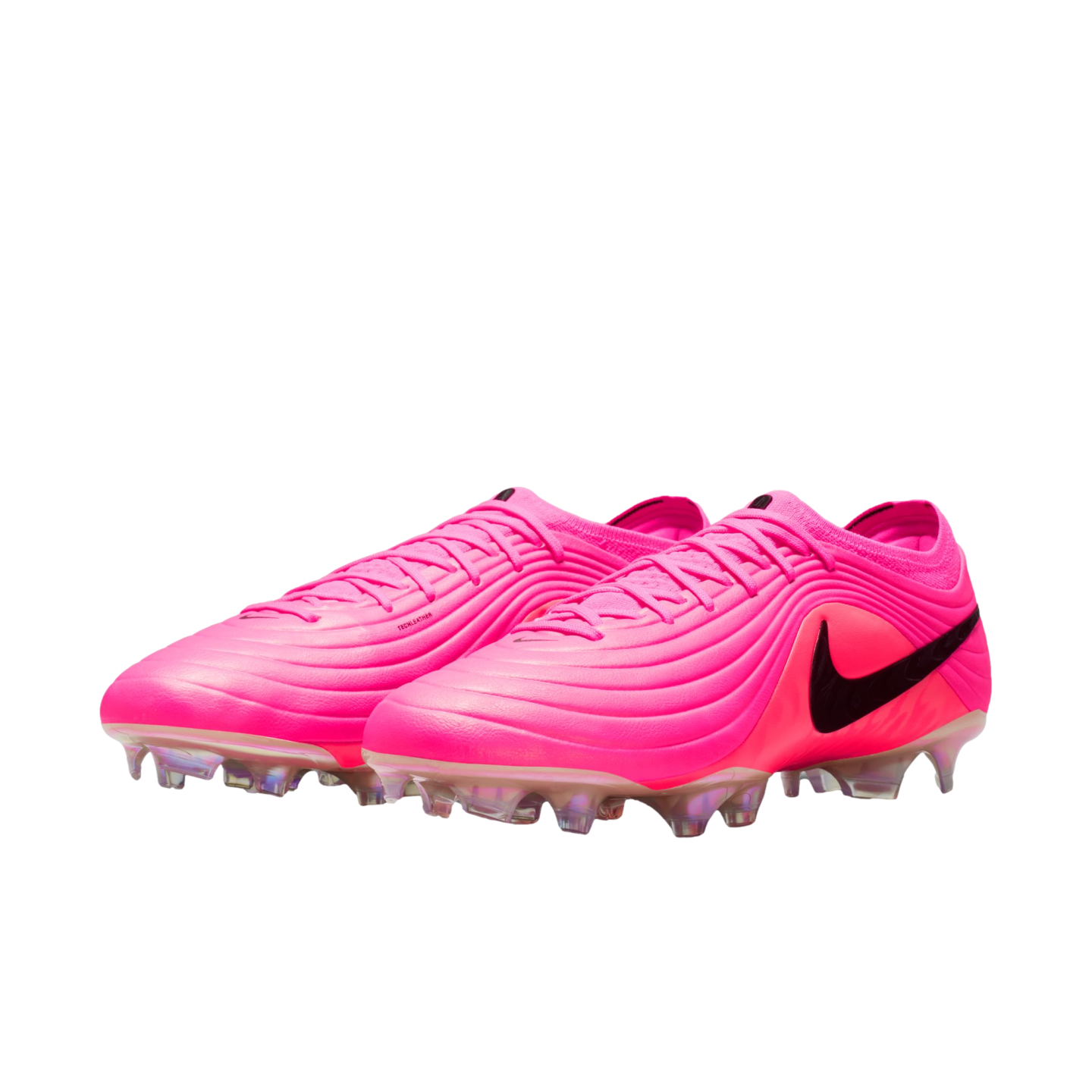 A pair of bright pink Nike soccer cleats with a black swoosh and iridescent studs, set against a white background.