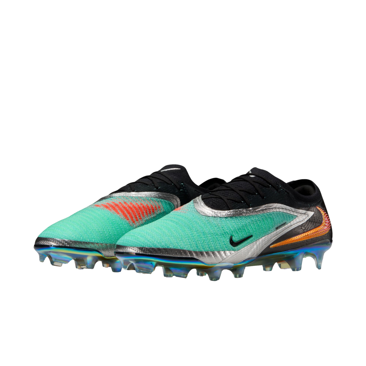 A pair of Nike Phantom GX 2 Elite soccer cleats in teal, black, and silver with an iridescent soleplate, shown from a three-quarter view against a white background.