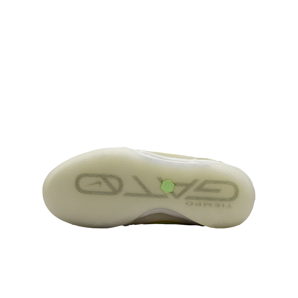 Translucent sole of a Nike Gato indoor soccer shoe showing the large 'GATO' logo and a small green hexagonal Nike emblem against a black background.
