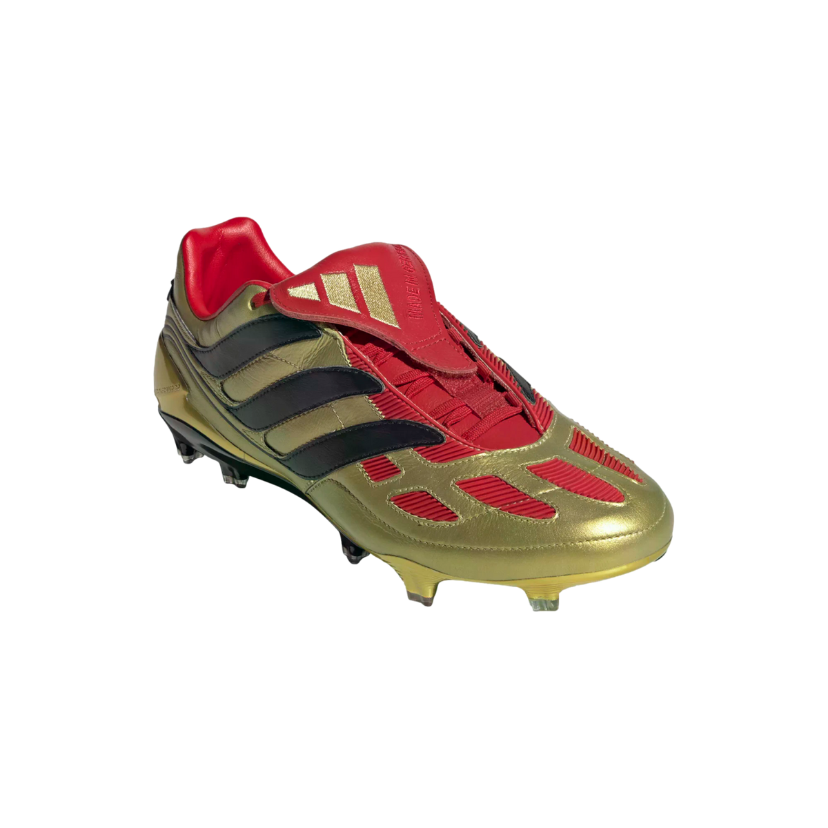 Metallic gold Adidas soccer cleat with black stripes and a red fold-over tongue, shown against a plain black background.