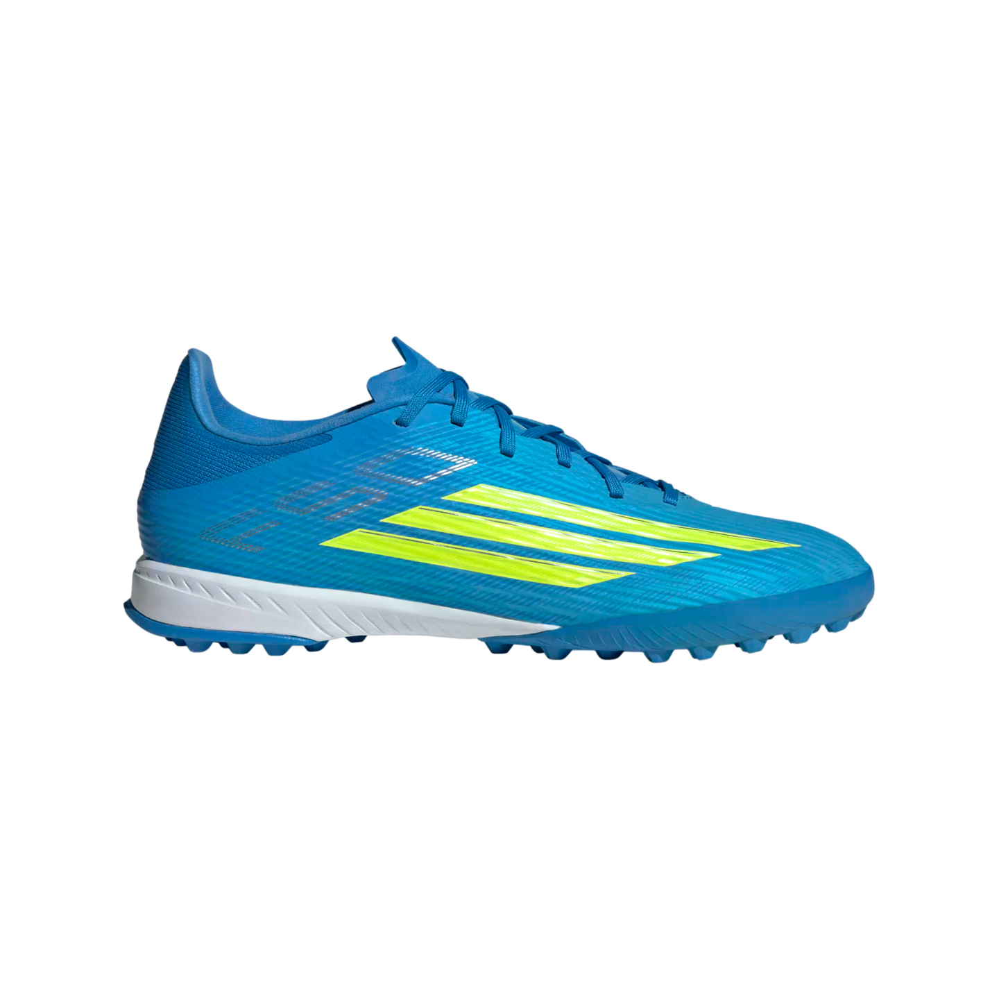 A side profile of a vibrant blue Adidas soccer turf shoe with three neon yellow stripes on a solid black background.