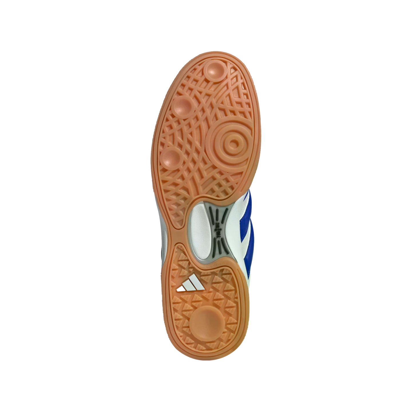 Bottom of an Adidas indoor shoe with a tan gum rubber sole featuring circular and triangular grip patterns against a solid black background.