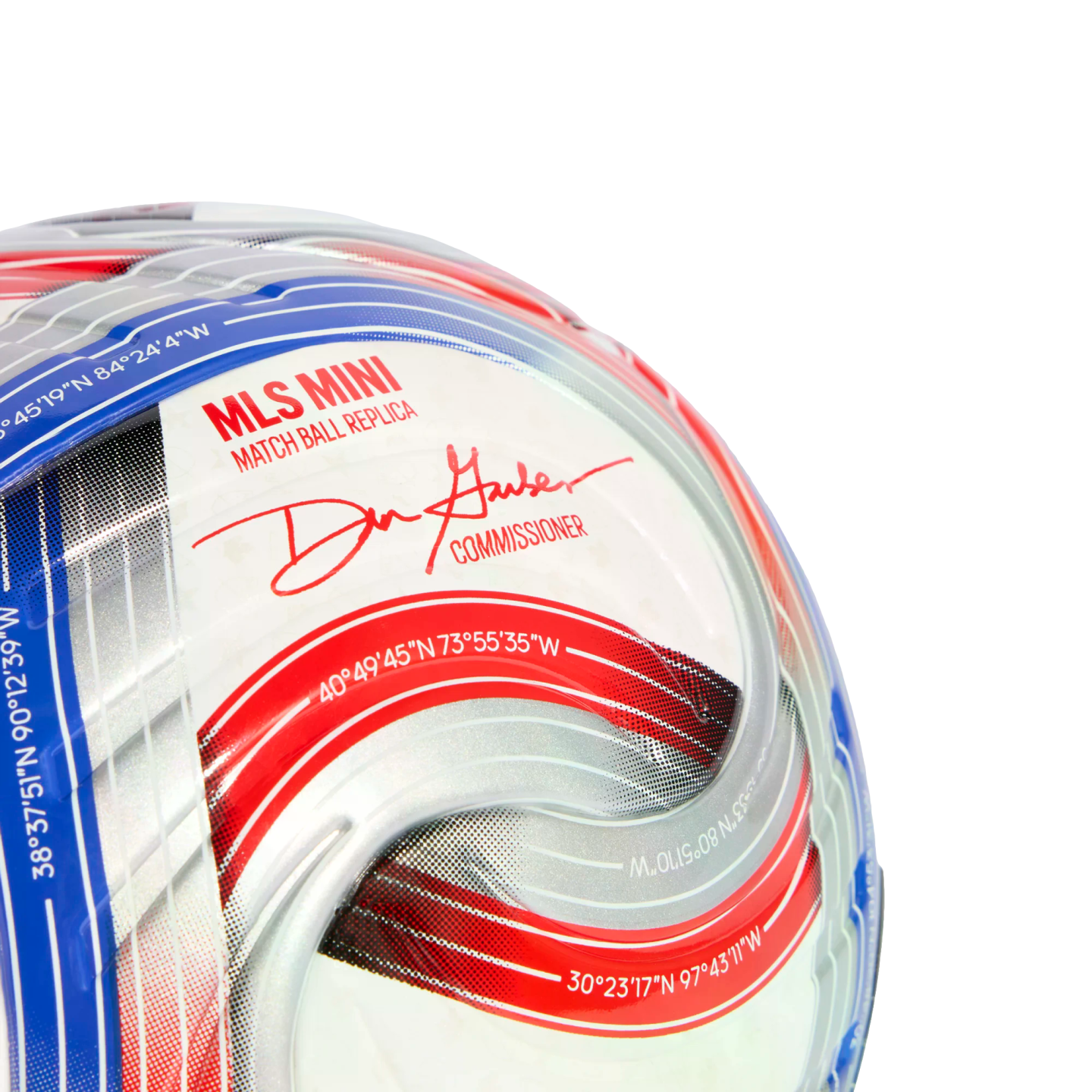 A close-up of a red, white, and blue MLS mini replica soccer ball with Commissioner Don Garber's signature and geographical coordinates.