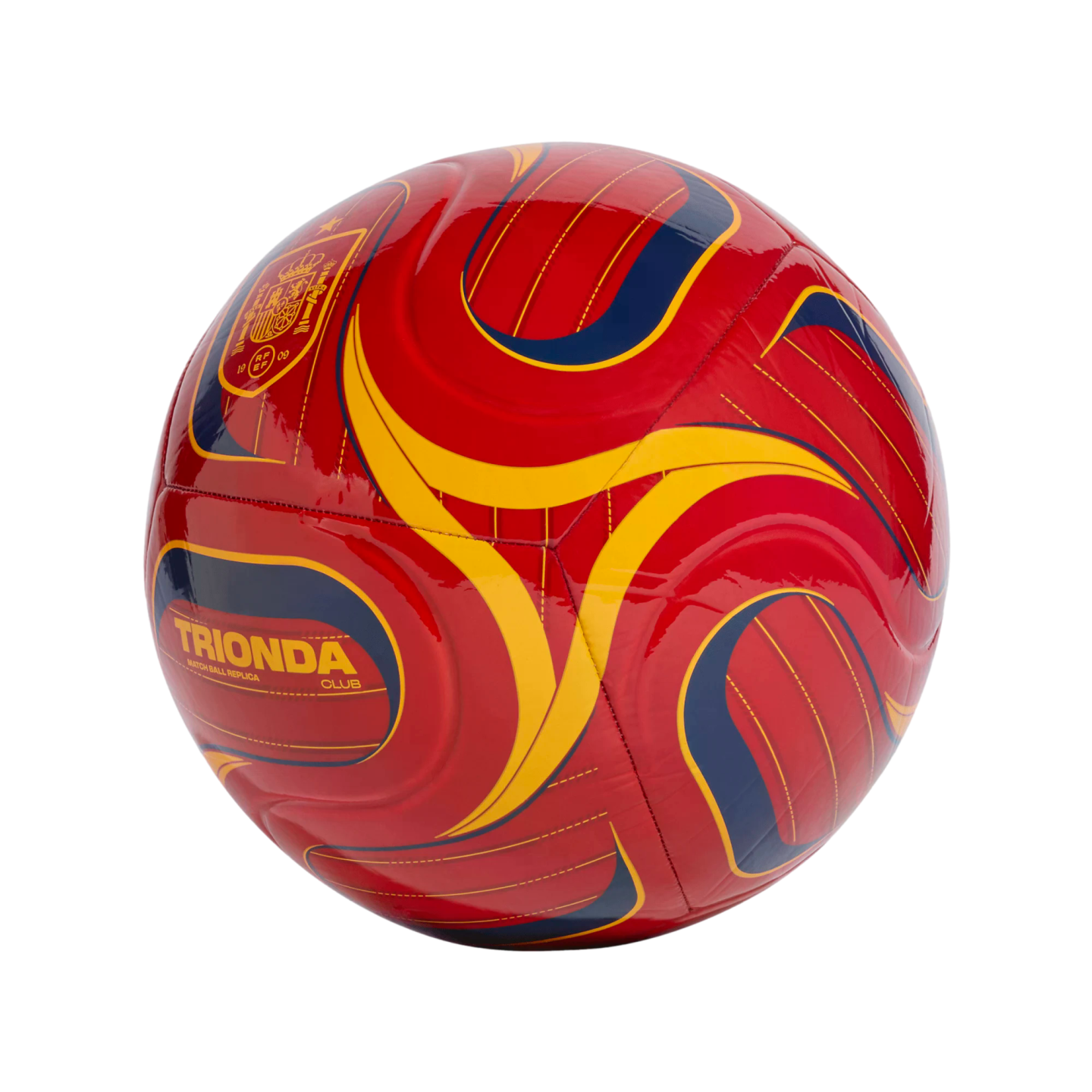 A red soccer ball with yellow and navy blue curved designs, featuring the Trionda Club logo and the Spanish football federation crest on a black background.