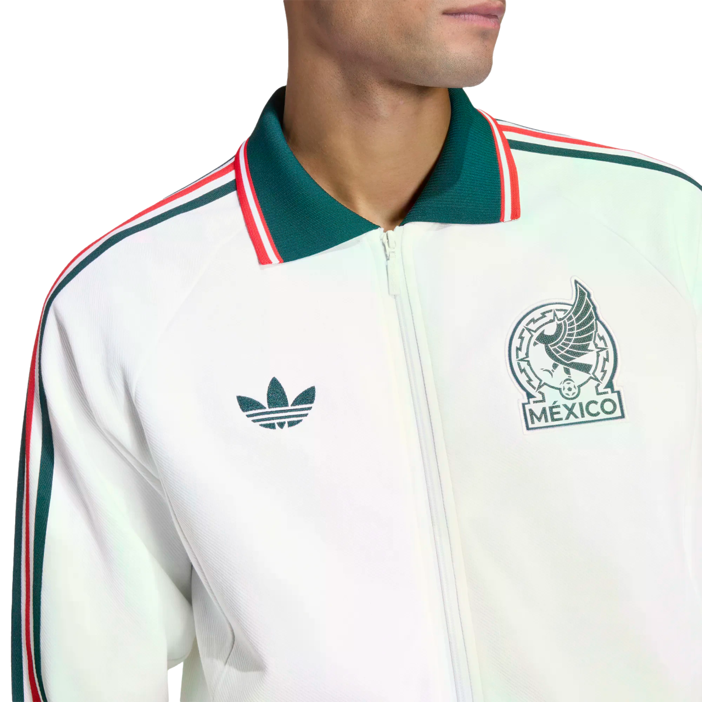 A white Adidas track jacket with the Mexico national team crest, a green polo-style collar with red and white stripes, and the Adidas trefoil logo.