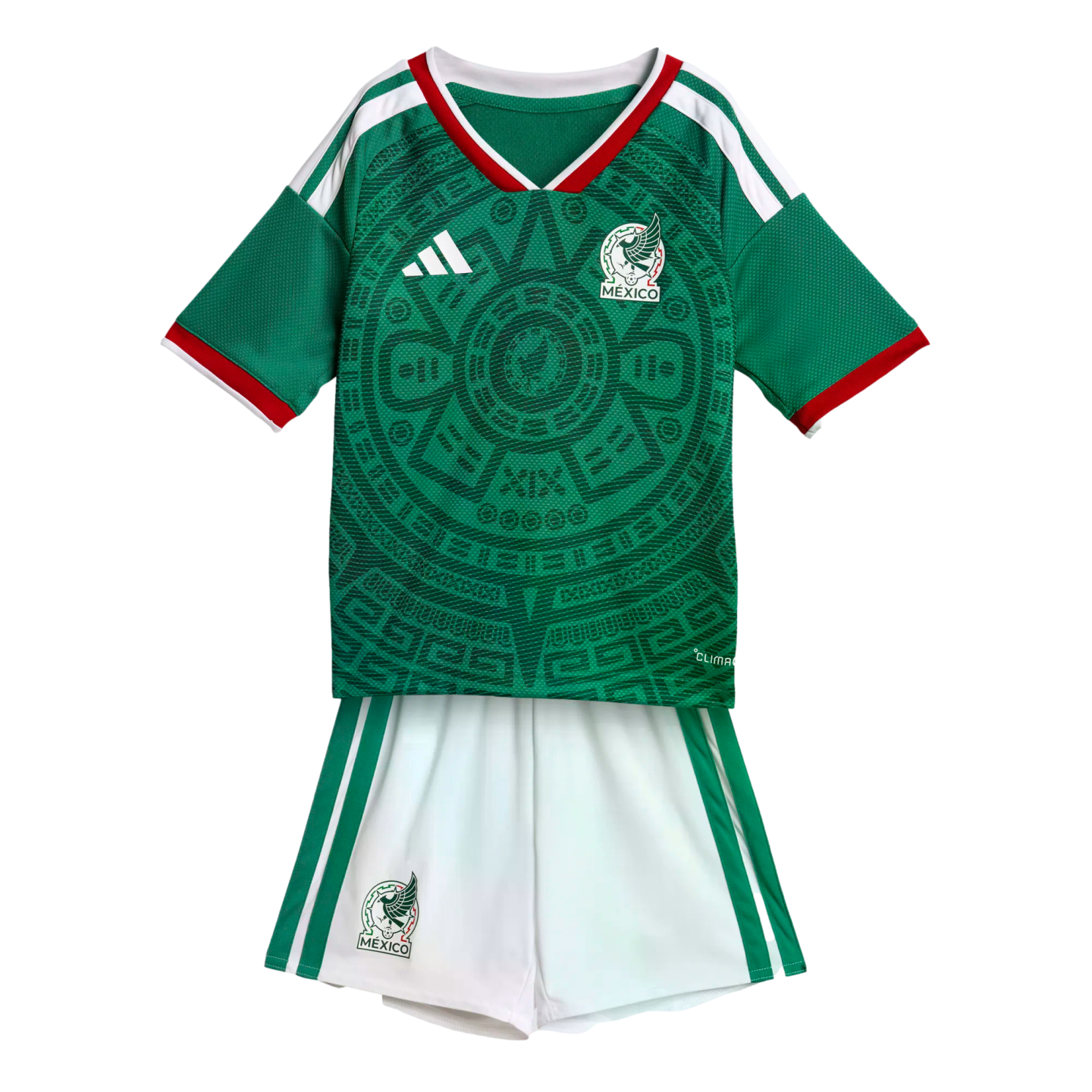 Mexico national football team kit with a green Aztec-patterned jersey and white shorts on a black background.