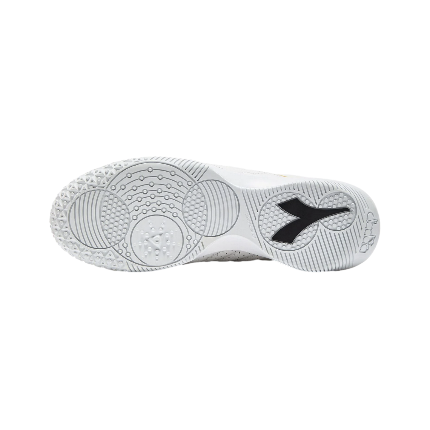 Sole of a white Diadora athletic shoe showing intricate traction patterns and a black brand logo, set against a plain black background.