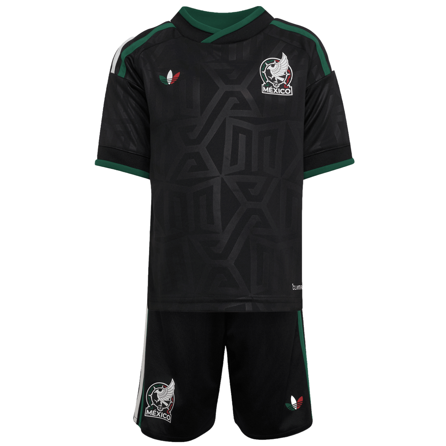 A black Mexico national team soccer kit featuring an Aztec-inspired pattern, team crest, and green and white accents on the jersey and shorts.